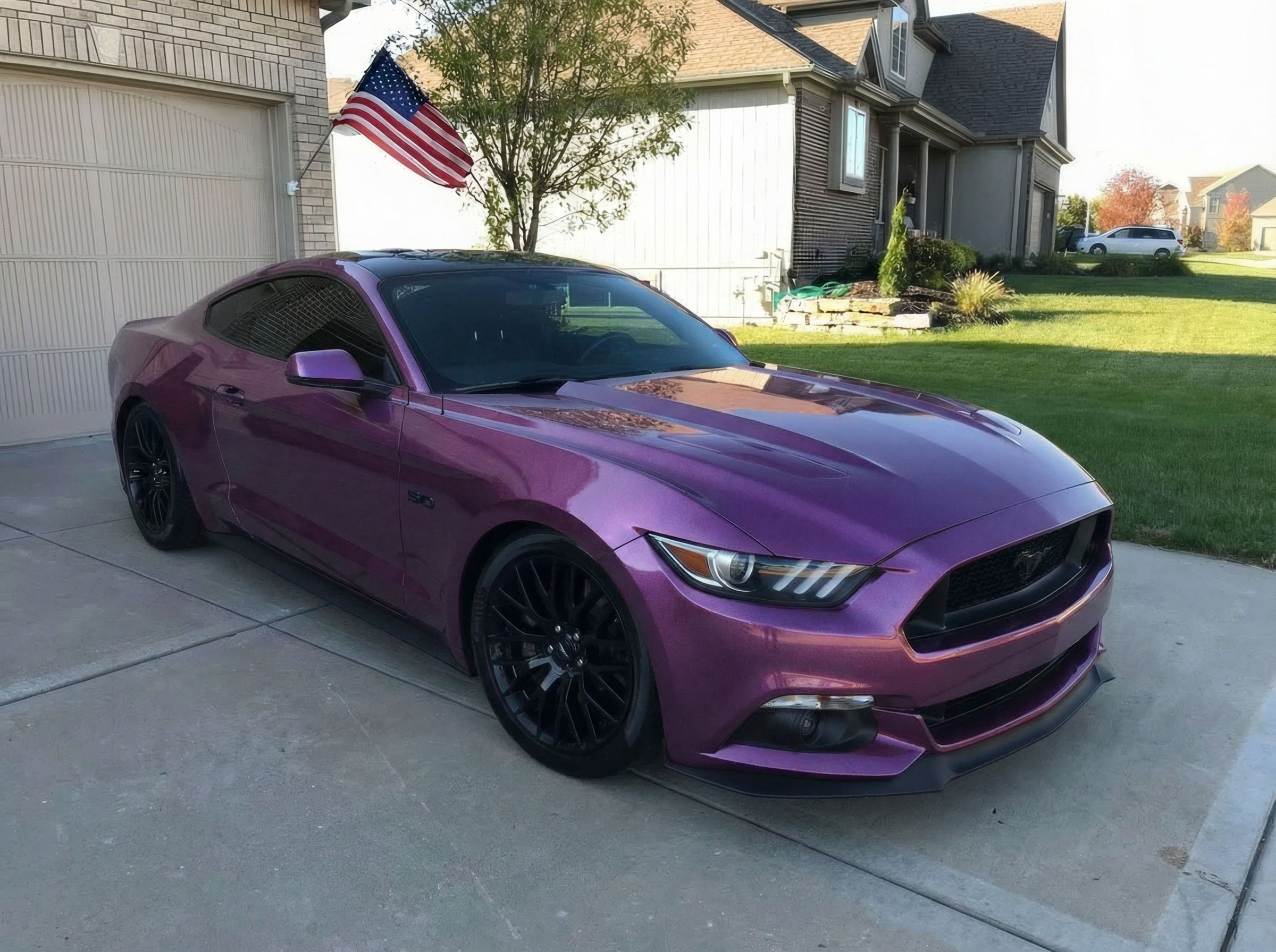 Ford Mustang GT wrapped in Avery Gloss Metallic Cosmic Rose